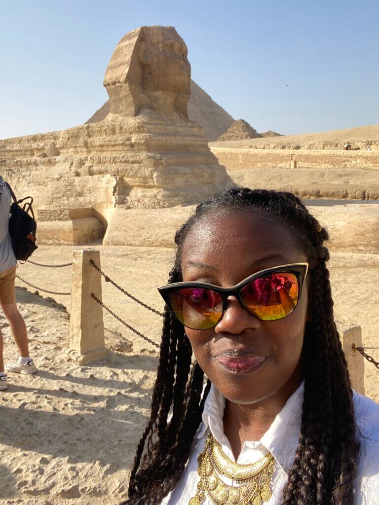 latisha in front of sphinx in Egypt